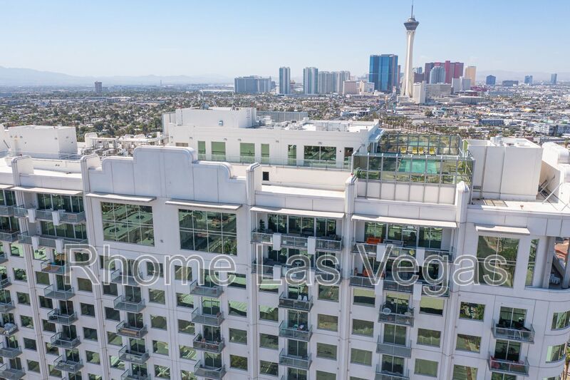 Modern Industrial Loft at Soho Lofts – 1BR/2BA High-Rise in the Arts District, City & Mountain Views! property image