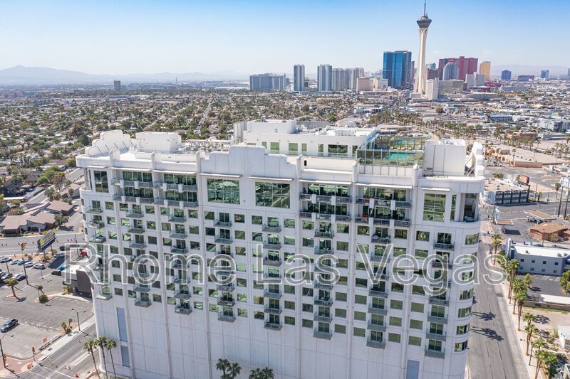 Modern Industrial Loft at Soho Lofts – 1BR/2BA High-Rise in the Arts District, City & Mountain Views! property image