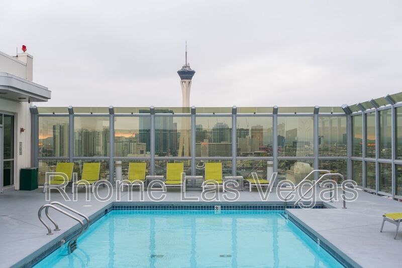 Modern Industrial Loft at Soho Lofts – 1BR/2BA High-Rise in the Arts District, City & Mountain Views! property image