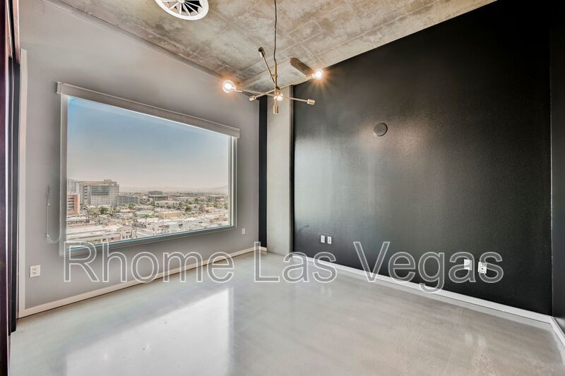 Modern Industrial Loft at Soho Lofts – 1BR/2BA High-Rise in the Arts District, City & Mountain Views! property image