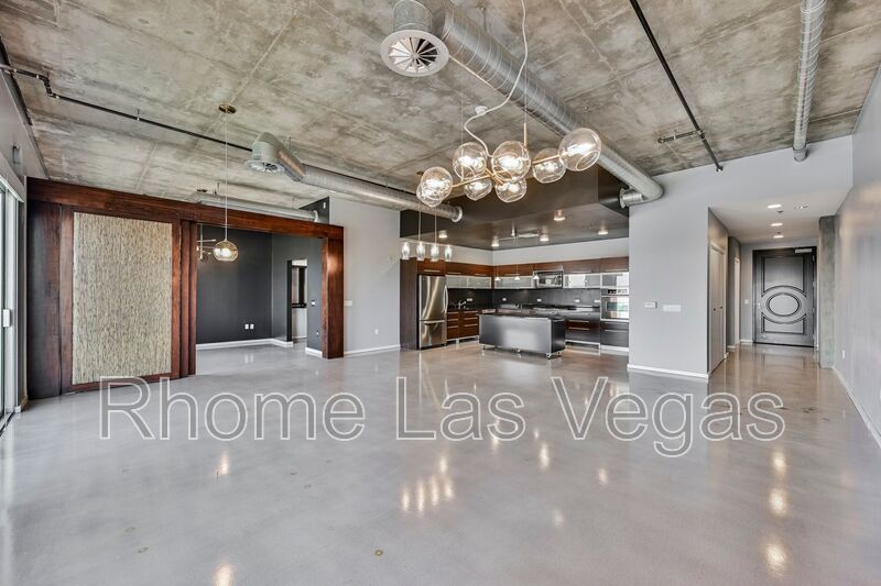 Modern Industrial Loft at Soho Lofts – 1BR/2BA High-Rise in the Arts District, City & Mountain Views! property image