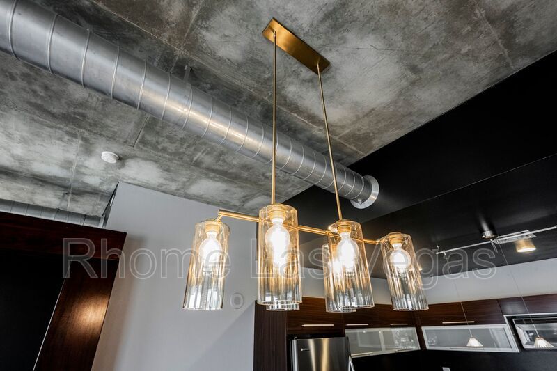 Modern Industrial Loft at Soho Lofts – 1BR/2BA High-Rise in the Arts District, City & Mountain Views! property image
