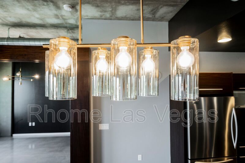 Modern Industrial Loft at Soho Lofts – 1BR/2BA High-Rise in the Arts District, City & Mountain Views! property image