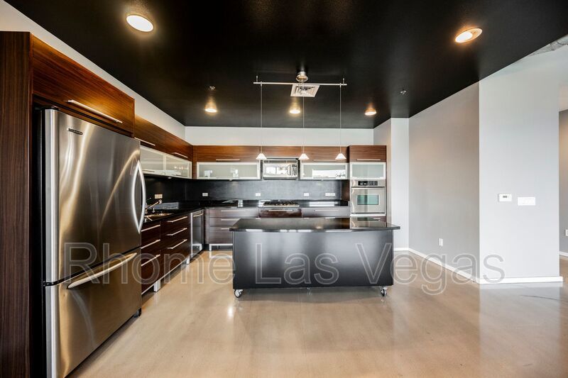 Modern Industrial Loft at Soho Lofts – 1BR/2BA High-Rise in the Arts District, City & Mountain Views! property image