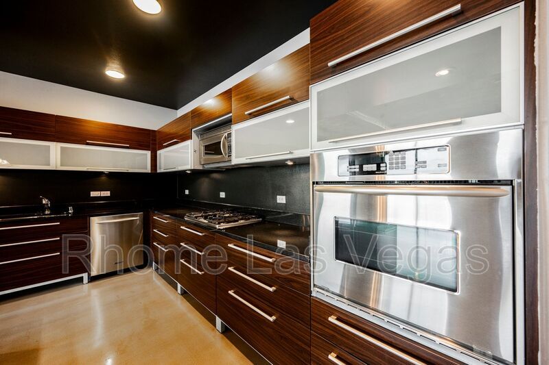 Modern Industrial Loft at Soho Lofts – 1BR/2BA High-Rise in the Arts District, City & Mountain Views! property image