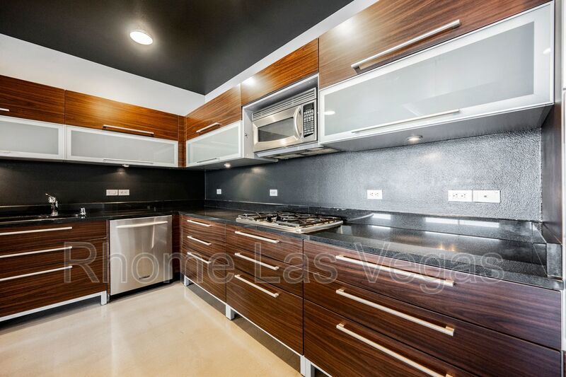 Modern Industrial Loft at Soho Lofts – 1BR/2BA High-Rise in the Arts District, City & Mountain Views! property image