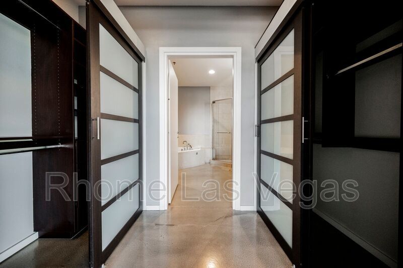 Modern Industrial Loft at Soho Lofts – 1BR/2BA High-Rise in the Arts District, City & Mountain Views! property image