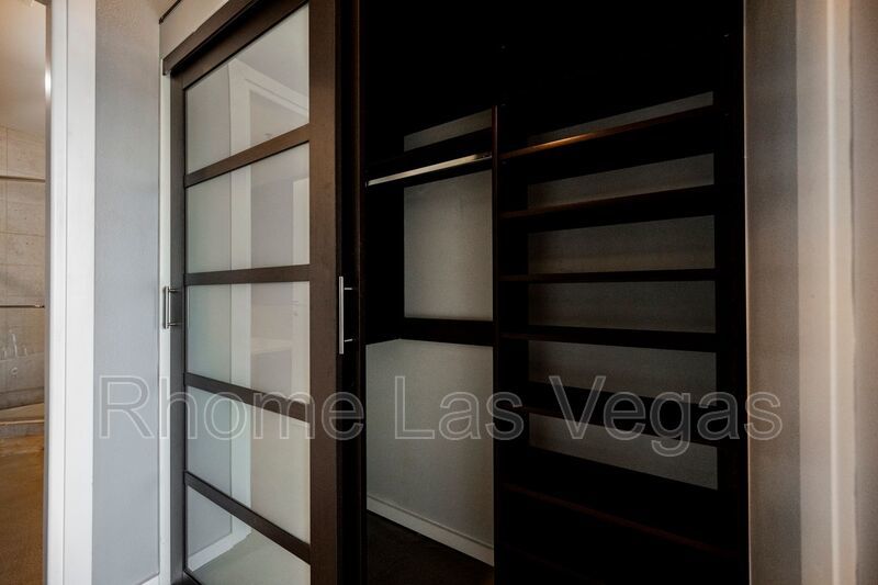 Modern Industrial Loft at Soho Lofts – 1BR/2BA High-Rise in the Arts District, City & Mountain Views! property image
