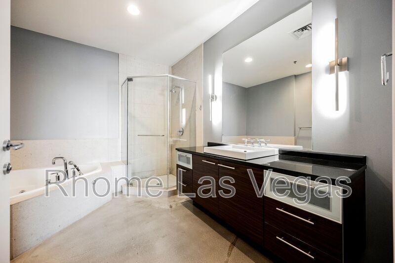 Modern Industrial Loft at Soho Lofts – 1BR/2BA High-Rise in the Arts District, City & Mountain Views! property image