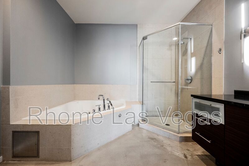 Modern Industrial Loft at Soho Lofts – 1BR/2BA High-Rise in the Arts District, City & Mountain Views! property image