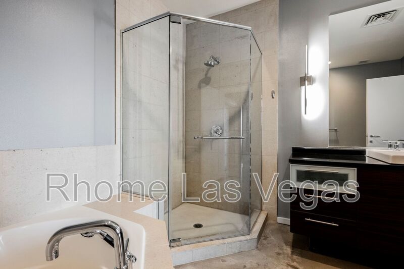 Modern Industrial Loft at Soho Lofts – 1BR/2BA High-Rise in the Arts District, City & Mountain Views! property image