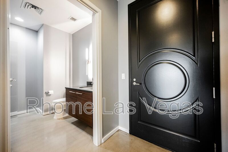 Modern Industrial Loft at Soho Lofts – 1BR/2BA High-Rise in the Arts District, City & Mountain Views! property image