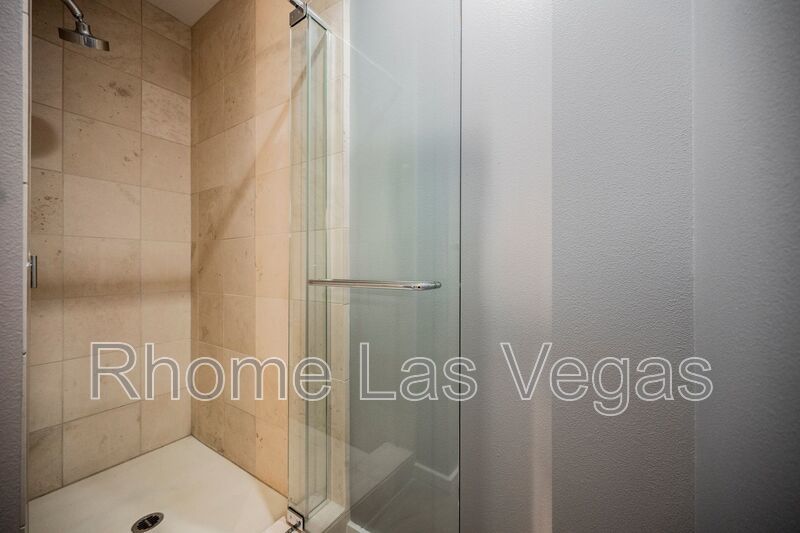 Modern Industrial Loft at Soho Lofts – 1BR/2BA High-Rise in the Arts District, City & Mountain Views! property image