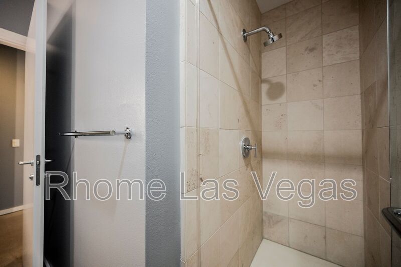 Modern Industrial Loft at Soho Lofts – 1BR/2BA High-Rise in the Arts District, City & Mountain Views! property image