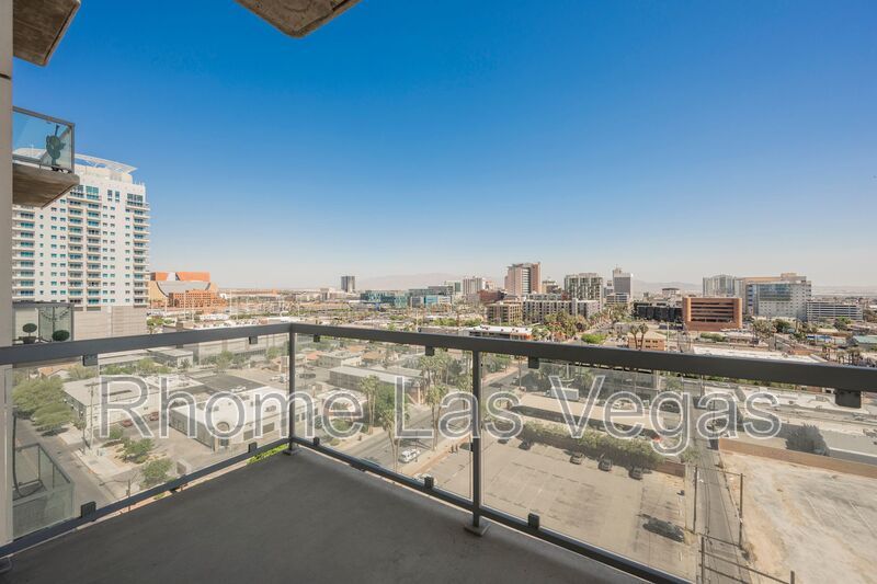 Modern Industrial Loft at Soho Lofts – 1BR/2BA High-Rise in the Arts District, City & Mountain Views! property image