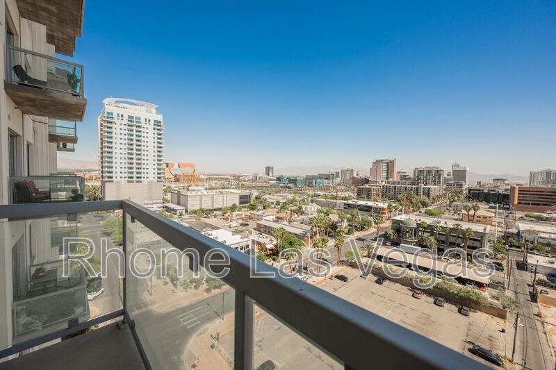 Modern Industrial Loft at Soho Lofts – 1BR/2BA High-Rise in the Arts District, City & Mountain Views! property image