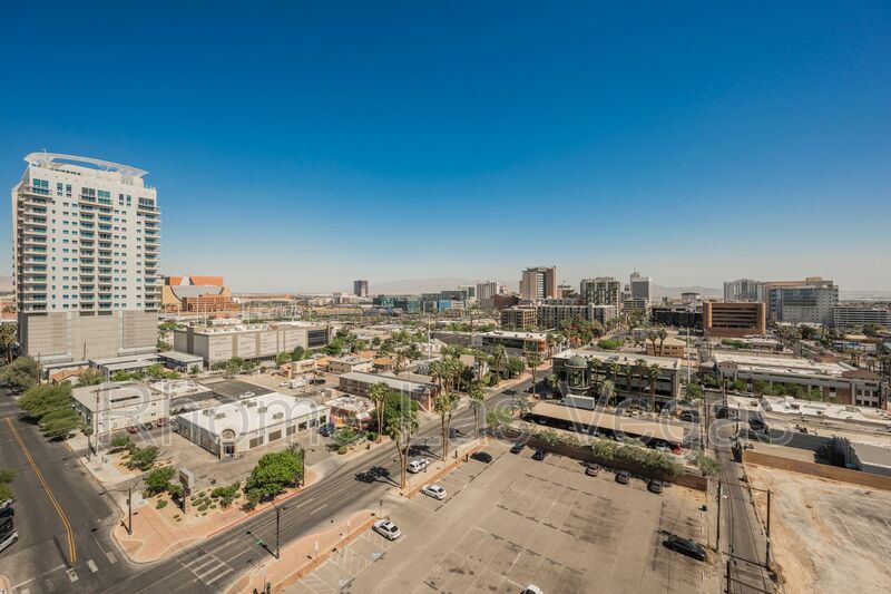 Modern Industrial Loft at Soho Lofts – 1BR/2BA High-Rise in the Arts District, City & Mountain Views! property image