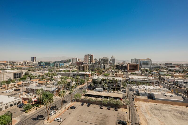 Modern Industrial Loft at Soho Lofts – 1BR/2BA High-Rise in the Arts District, City & Mountain Views! property image