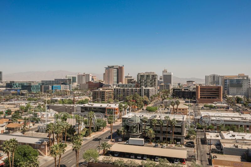 Modern Industrial Loft at Soho Lofts – 1BR/2BA High-Rise in the Arts District, City & Mountain Views! property image