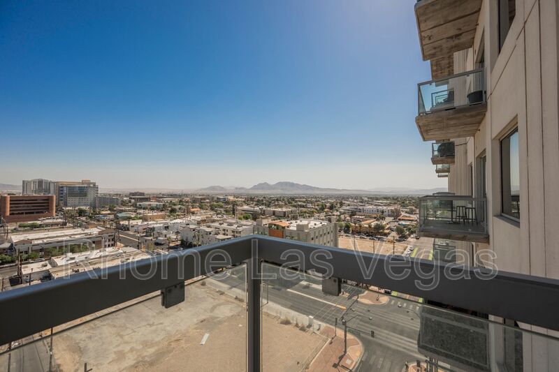 Modern Industrial Loft at Soho Lofts – 1BR/2BA High-Rise in the Arts District, City & Mountain Views! property image