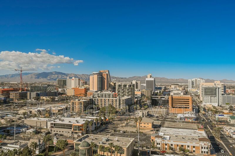 Modern Industrial Loft at Soho Lofts – 1BR/2BA High-Rise in the Arts District, City & Mountain Views! property image