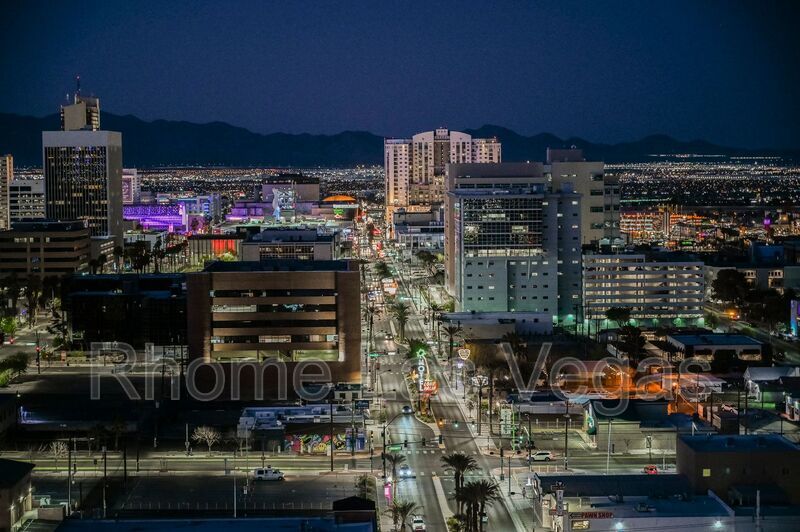 Modern Industrial Loft at Soho Lofts – 1BR/2BA High-Rise in the Arts District, City & Mountain Views! property image