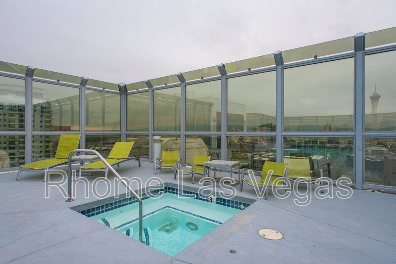 Modern Industrial Loft at Soho Lofts – 1BR/2BA High-Rise in the Arts District, City & Mountain Views! property image