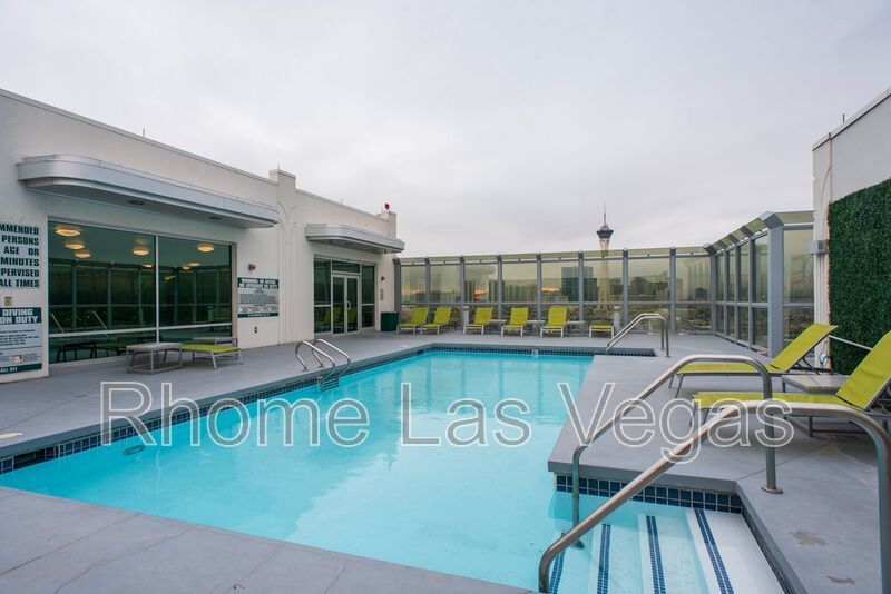 Modern Industrial Loft at Soho Lofts – 1BR/2BA High-Rise in the Arts District, City & Mountain Views! property image