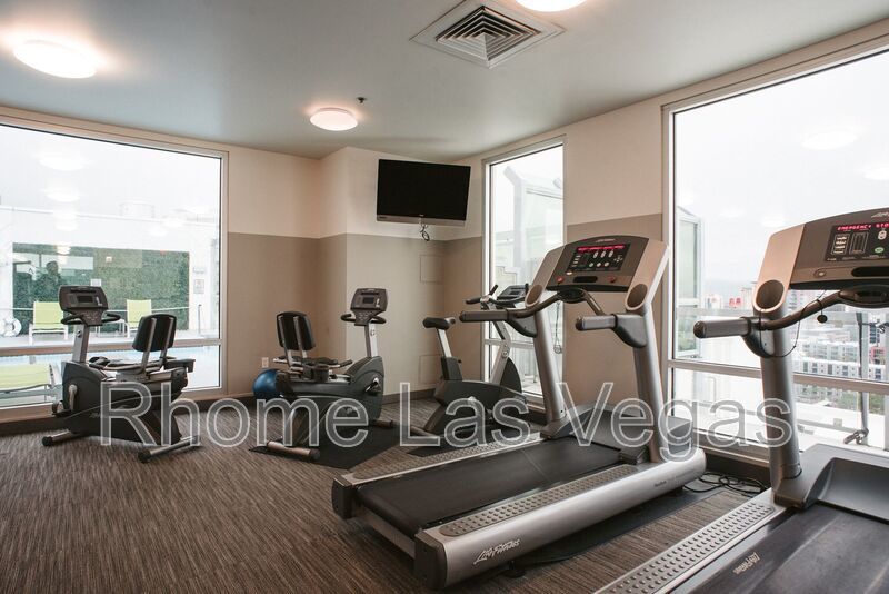 Modern Industrial Loft at Soho Lofts – 1BR/2BA High-Rise in the Arts District, City & Mountain Views! property image