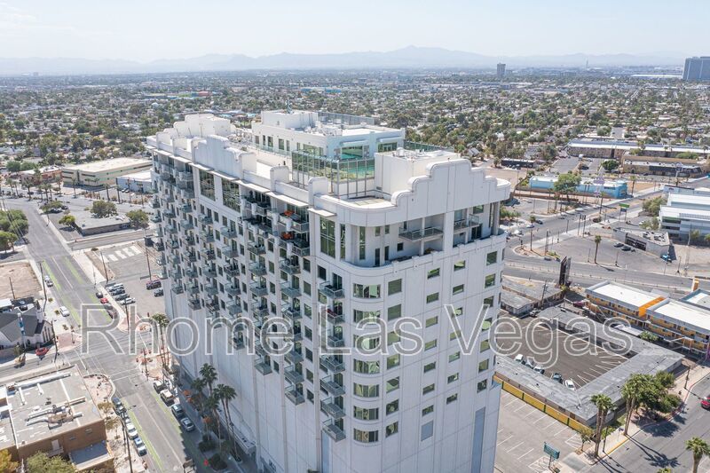 Modern Industrial Loft at Soho Lofts – 1BR/2BA High-Rise in the Arts District, City & Mountain Views! property image
